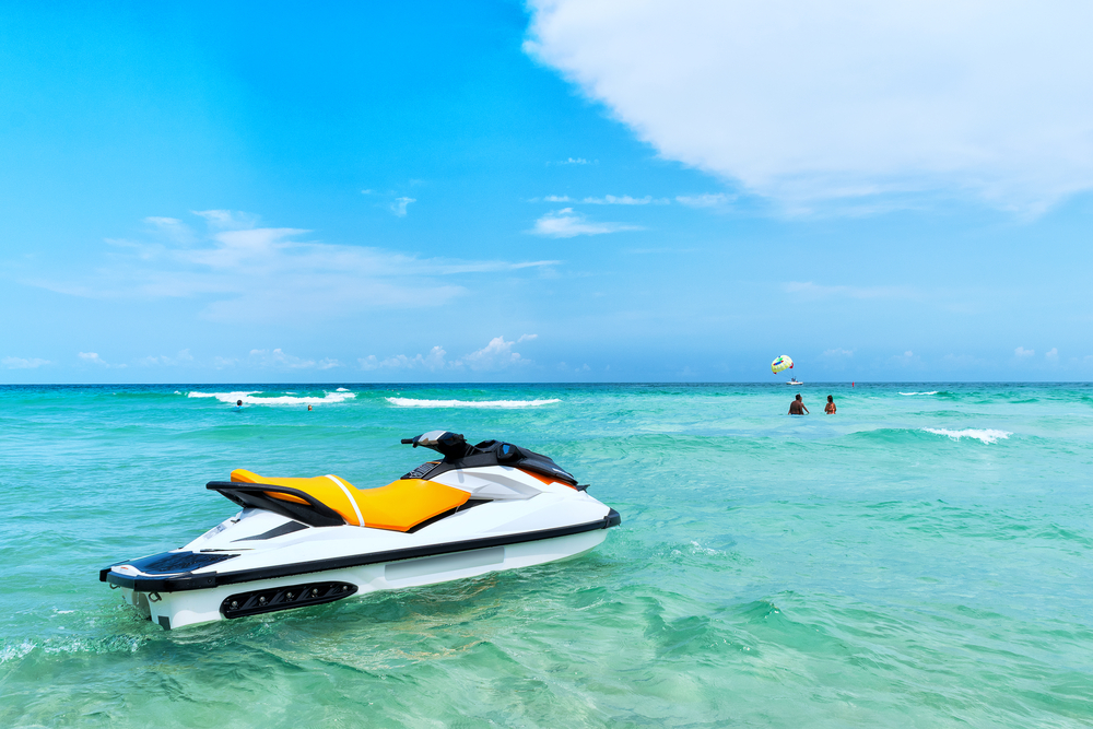 Blue,sea,and,a,jet,ski,floating,on,the,sea,